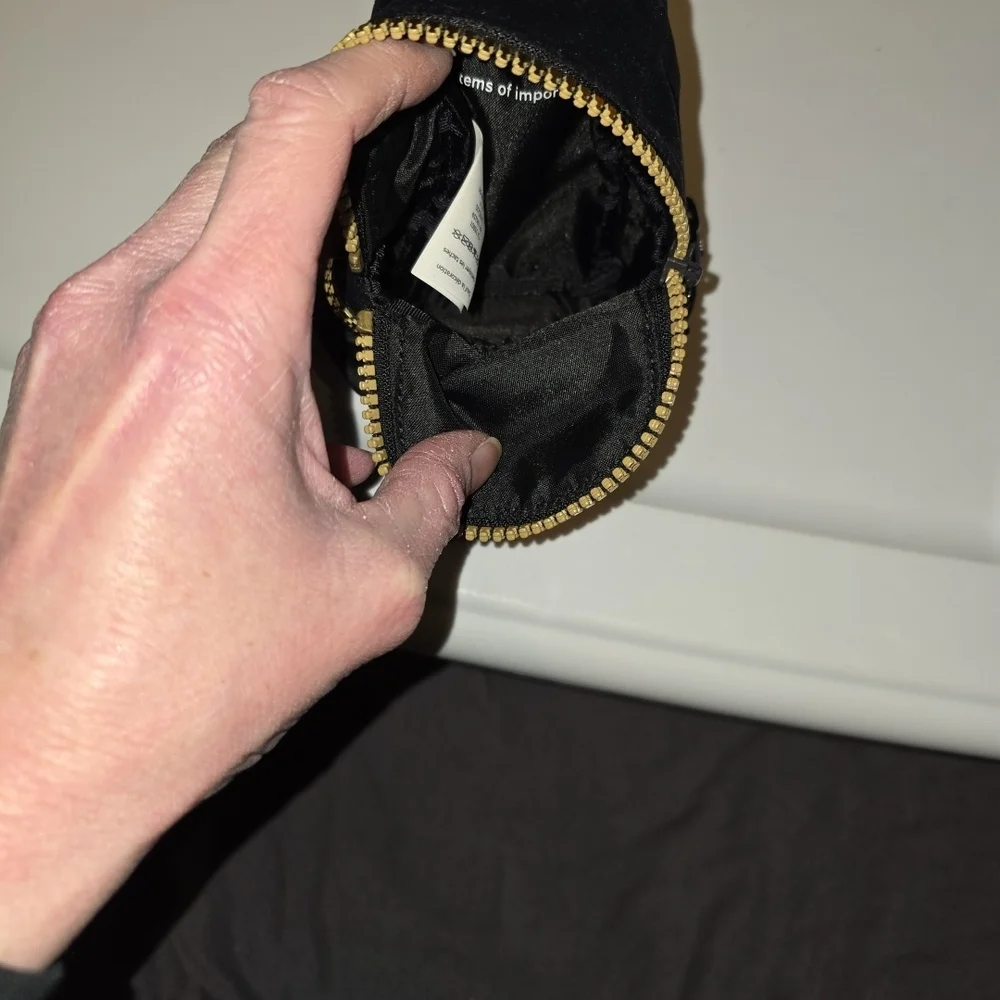 Lululemon Black Micro Backpack Key Holder with Gold Zipper